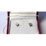 A PAIR OF 18CT GOLD AND ROUND CUT DIAMOND STUD EARRINGS. (approx total diamond weight 0.30ct)