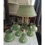 A TOLEWARE THREE CANDLE TABLE LAMP In apple green with cream floral decoration along with three wall