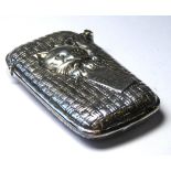 A STERLING SILVER NOVELTY 'CAT IN A BASKET'VESTA CASE Recumbent cat in wicker basket with tag 'Ready