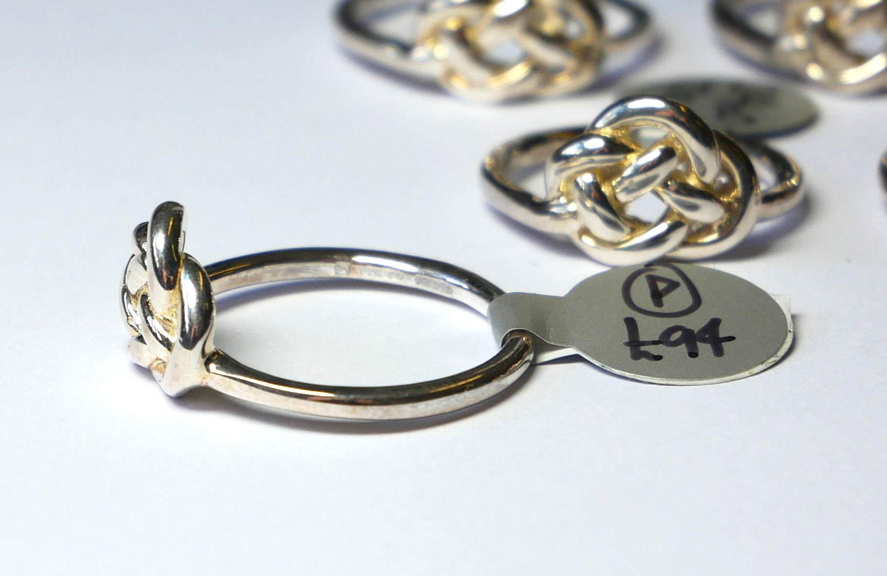 TEN SILVER .925 LOVE KNOT RINGS. - Image 2 of 2