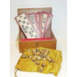 A VINTAGE CASED RUSSIAN TREEN LOTO BOARD GAME Lithograph printed box with turned wooden barrel