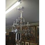 FRENCH GILT METAL AND CRYSTAL GLASS CHANDELIER.