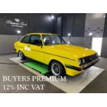 A 1979 YELLOW FORD ESCORT RS2000 CLASSIC CAR With black trim. Condition: pristine