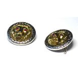 A PAIR OF SILVER GILT LION MASK GENTS CUFFLINKS Gilt mask set with red glass eyes. (approx