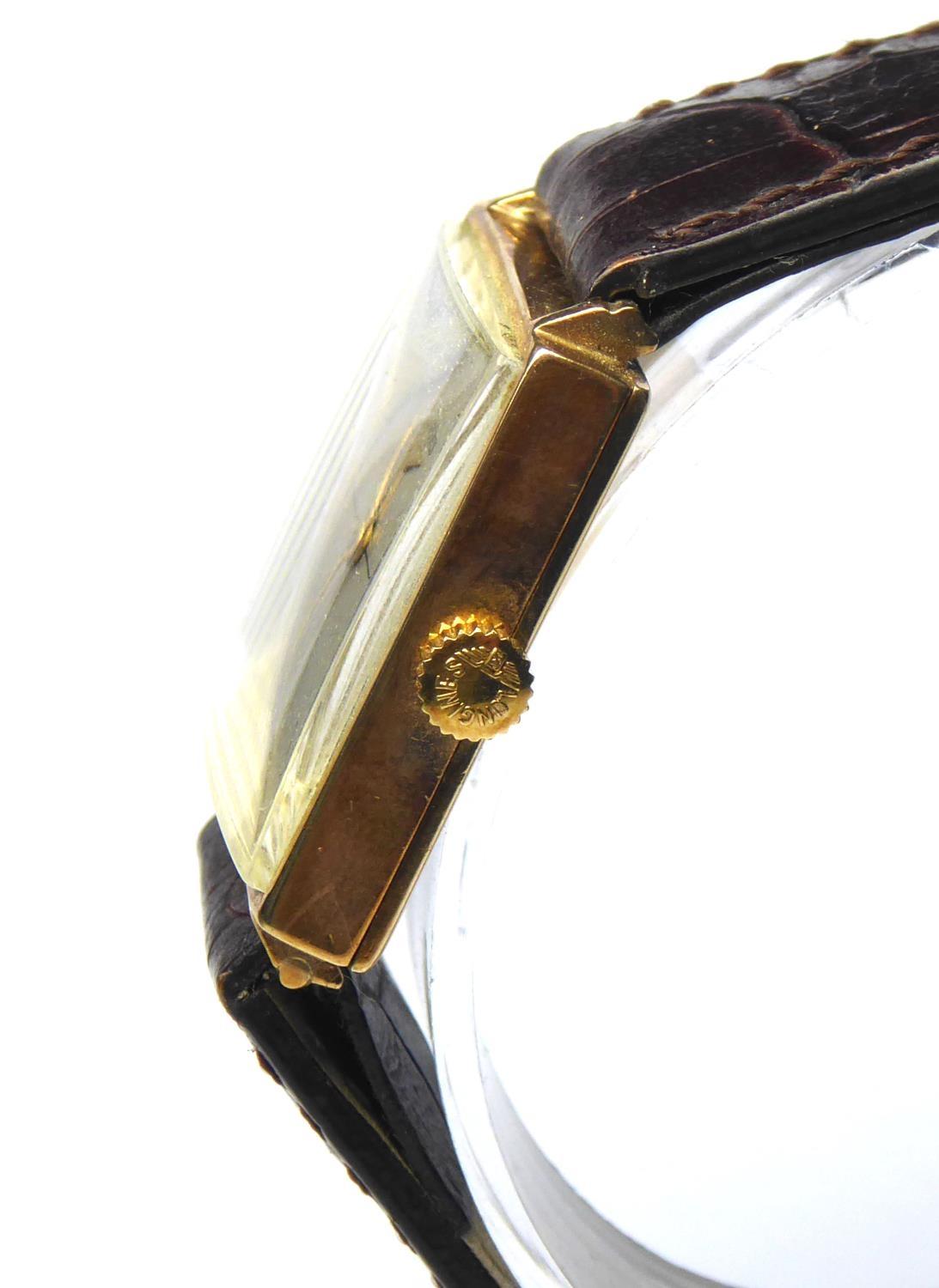 LONGINES, A VINTAGE 9CT GOLD GENT'S WRISTWATCH Square form with champagne dial and gilt hands, on - Image 7 of 7