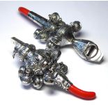 TWO CONTINENTAL SILVER CHILD'S TEETHING RATTLES Set with whistles and bells, marked '800'. (approx