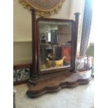 A LARGE VICTORIAN MAHOGANY FREESTANDING TOILET MIRROR Raised on turned columns standing on a