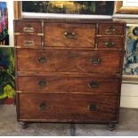 AN EARLY 19TH CENTURY TEAK MILITARY SECRETAIRE CAMPAIGN CHEST With brass corner mounts and