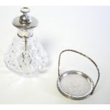 A 20TH CENTURY SILVER AND CUT GLASS SCENT BOTTLE Engined turned decoration and cut glass base,