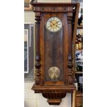 A LARGE VICTORIAN WALNUT VIENNA REGULATOR CLOCK The enamel dial with Roman numerals, complete with