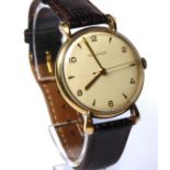 JAEGER LECOULTRE, AN EARLY 20TH CENTURY 9CT GOLD GENT'S WRISTWATCH Having a cream tone dial, with
