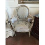 A 19TH CENTURY FRENCH HEPPLEWHITE DESIGN CARVED SPOONBACK OPEN ARMCHAIR. (69cm x 38cm x 95cm)