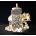 A HEAVY SILVER PLATED TWO BOTTLE CRUET, IN THE FORM OF AN ELEPHANT. (12cm)