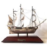 A 20TH CENTURY SILVER MODEL OF HMS VICTORY GALLEON Full sail with silver gilt plating on a