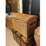 A LARGE DOME TOP WICKER BASKET With leather carry handles, along with another of rectangular form,