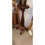 A 19TH CENTURY MAHOGANY TORCHERE On quadraform base. (40cm x 40cm x h 100cm)