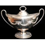 A LARGE VICTORIAN SILVER PLATED OVAL NAVETTE FORM SOUP TUREEN AND COVER With twin handles, applied