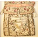 AN 18TH CENTURY LADIES FLORAL EMBROIDERED BAG With gold threaded details, mounted, framed and