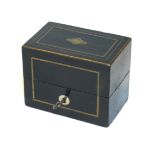 AN EARLY 19TH CENTURY EBONY AND BRASS BOX , rectangular form with brass stringing and blue velvet