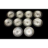 A SET OF TEN VICTORIAN GLASS ICE PLATES Having raised decoration to reverse. (approx 16cm)