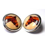 A PAIR OF SILVER AND ENAMEL EQUESTRIAN GENTS CUFFLINKS Spherical form, with race horse head. (approx