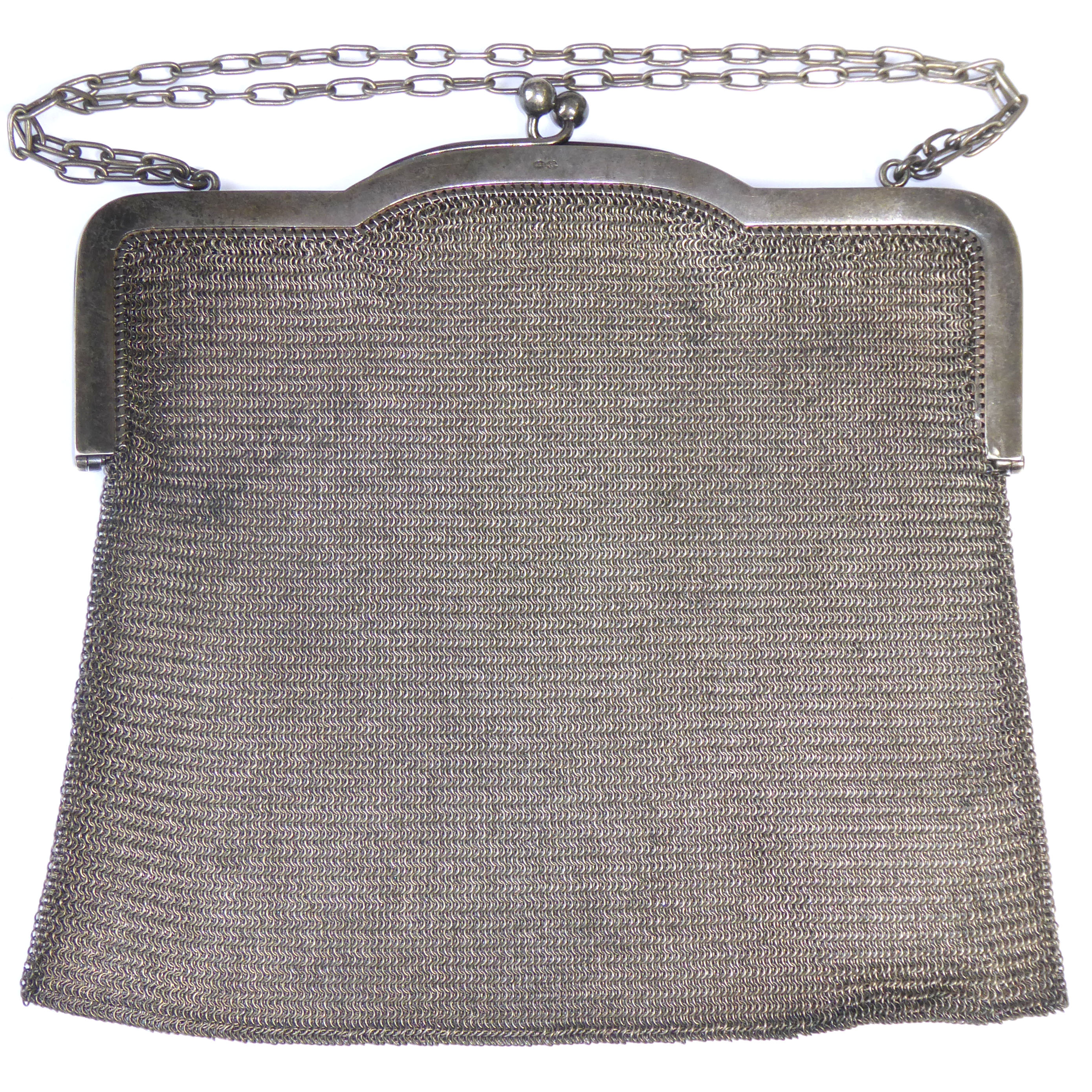 AN EARLY 20TH CENTURY SILVER MESH PURSE Having a carry chain and solid frame, import marks '.