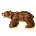 A COLD PAINTED BRONZE FIGURE OF A BEAR Prowling pose, unmarked. (approx 18cm x 8cm)