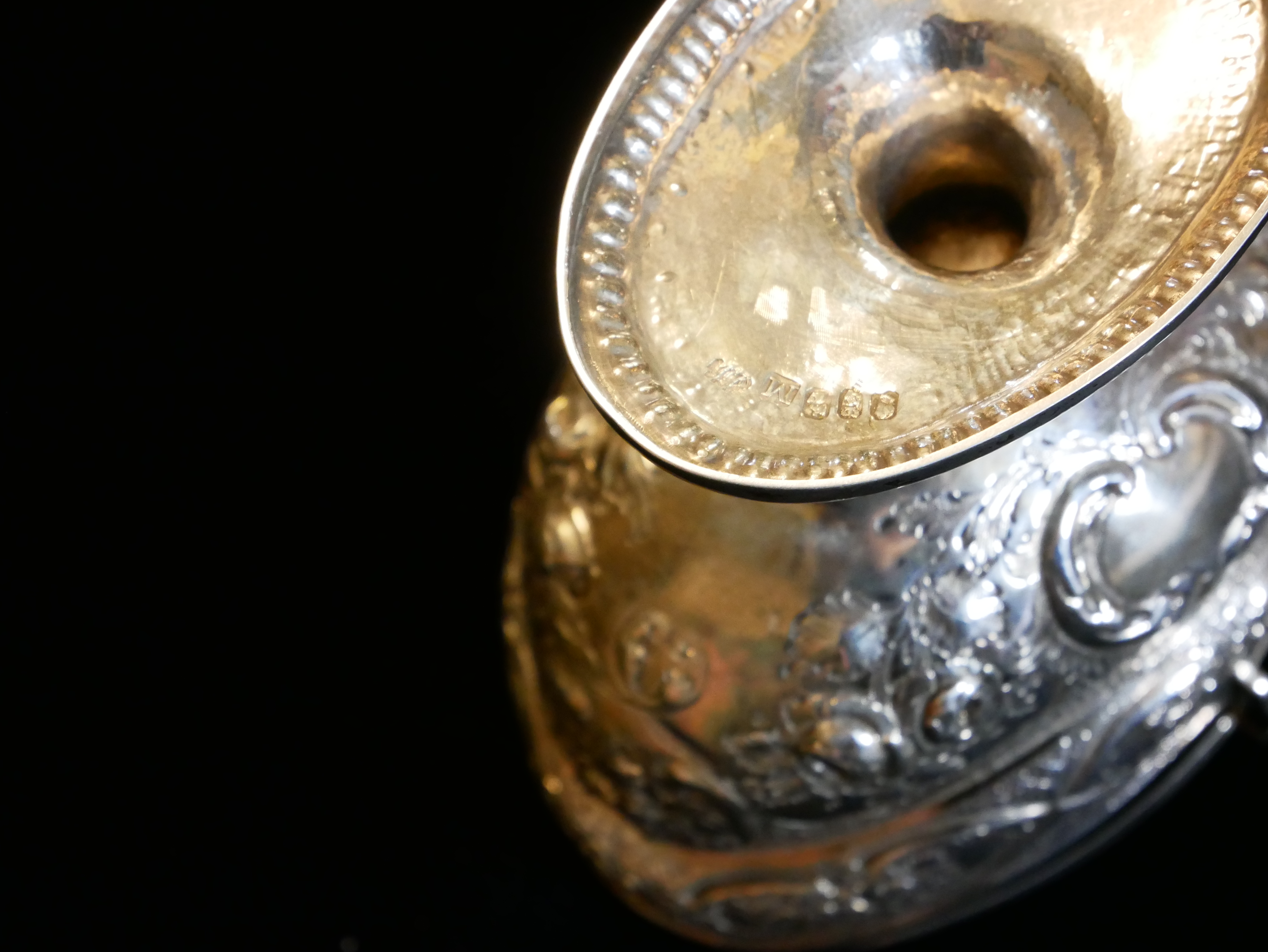 A GEORGIAN IRISH SILVER SWEETMEAT BASKET Having a swing handle, embossed floral decoration and - Image 5 of 5