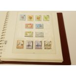 STAMPS OF JERSEY 1969-1986 Contained in a dedicated pictorial album and sleeve to include postage