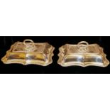 ELKINGTON, A PAIR OF SILVER PLATED ENTREE DISHES Scalloped form with circular handles and
