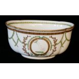 A 19TH CENTURY CONTINENTAL PORCELAIN OVAL BASIN Hand painted with an exotic bird in gilt cartouche