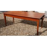 A 19TH CENTURY FRENCH SOLID FRUITWOOD THREE PLANK TOP TABLE With a single drawer, raised on square