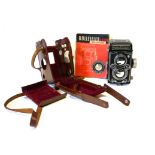 A ROLLIEFLEX 3.5 MX-EVS CAMERA, 1954 With leather case and booklet.