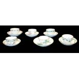 A COLLECTION OF SIX CHELSEA DERBY PORCELAIN TEA BOWLS AND SAUCERS Hand painted floral decoration