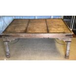 A SPANISH HARDWOOD AND IRON BOUND DINING TABLE With lightly carved decoration, raised on four