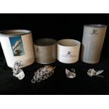 SWAROVSKI,A COLLECTION OF FOUR CRYSTAL SCULPTURES,comprising of a 'care for me whale','Silver