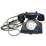 BAKELITE, AN EARLY/MID 20TH CENTURY BLACK PHONE Converted for modern use.