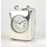 A SILVER CASED RECTANGULAR CARRIAGE CLOCK With carriage handle, the circular dial marked 'Barber and