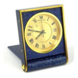 JAEGER LECOULTRE, MEMOREX, A RARE GOLD PLATED AND FAUX LAPIS LAZULI TRAVEL CLOCK Rectangular form