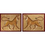 A PAIR OF LARGE INDIAN WALL HANGINGS Painted with roaring tigers, posed Dexter and Sinister. (
