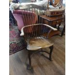 A 19TH CENTURY ASH AND ELM WYCOMBE COMBE BACK CHAIR Raised on cabriole legs, joined by a crinoline