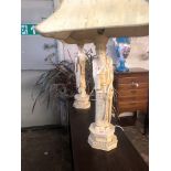 A LARGE PAIR OF ORIENTAL IVORINE FIGURAL TABLE LAMPS Complete with shades. (61cm without shades)