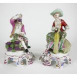 A PAIR OF GERMAN PORCELAIN FIGURES, YOUNG GIRL AND BEAU Wearing 18th Century attire on scrolled form