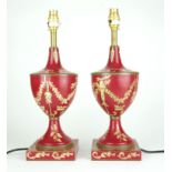 A PAIR OF RED TOLEWARE URN FORM TABLE LAMPS. (h 40cm)