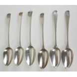A SET OF SIX GEORGIAN SILVER TABLESPOONS Fiddle pattern with engraved dragon crest, hallmarked