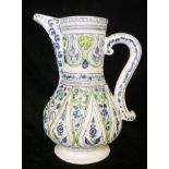 AN RARE, LARGE AND FINE 18TH CENTURY TURKISH KUTAHTA POTTERY BALUSTER EWER With scrolled handle