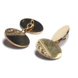 A VINTAGE PAIR OF 9CT GOLD GENT'S OVAL CUFFLINKS With half scrolled design. (approx 2cm)