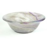 A CARVED AGATE HARDSTONE BOWL With purple hue. (diameter 19cm x h 6cm)