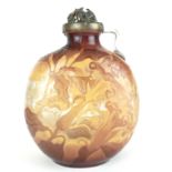 GALLE, AN EARLY 20TH CENTURY CAMEO GLASS OVOID MOON FLASK With pierced nickel plate lid and floral