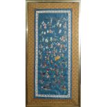 A 20TH CENTURY CHINESE SILK EMBROIDERY PANEL Titled '1000 Boys' having figures at play with